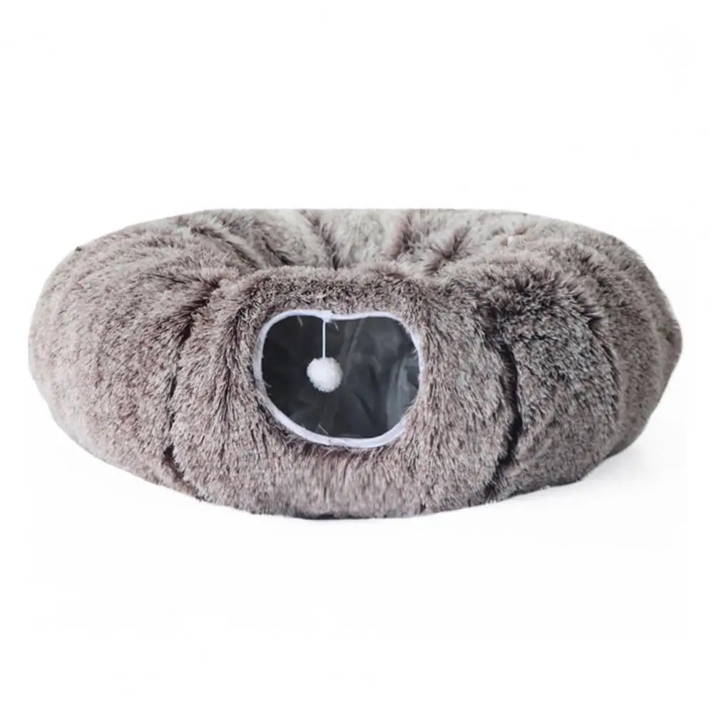 Fluffy gray donut-shaped pet bed on a white background