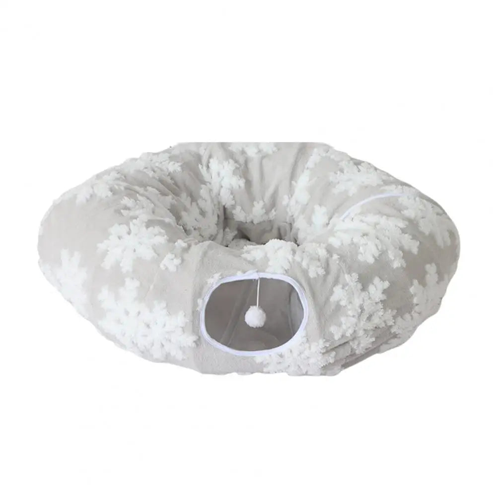Fluffy white donut-shaped pet bed on a white background