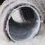 Pet bed with a mesh bottom on a soft surface