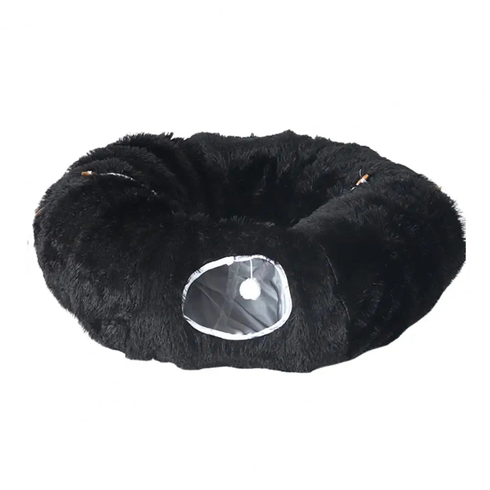 Black fluffy pet bed on a white background