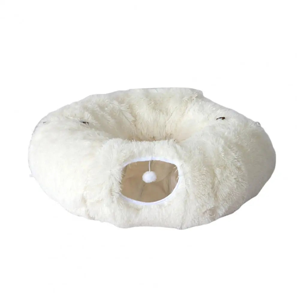 White fluffy donut-shaped pet bed on a white background